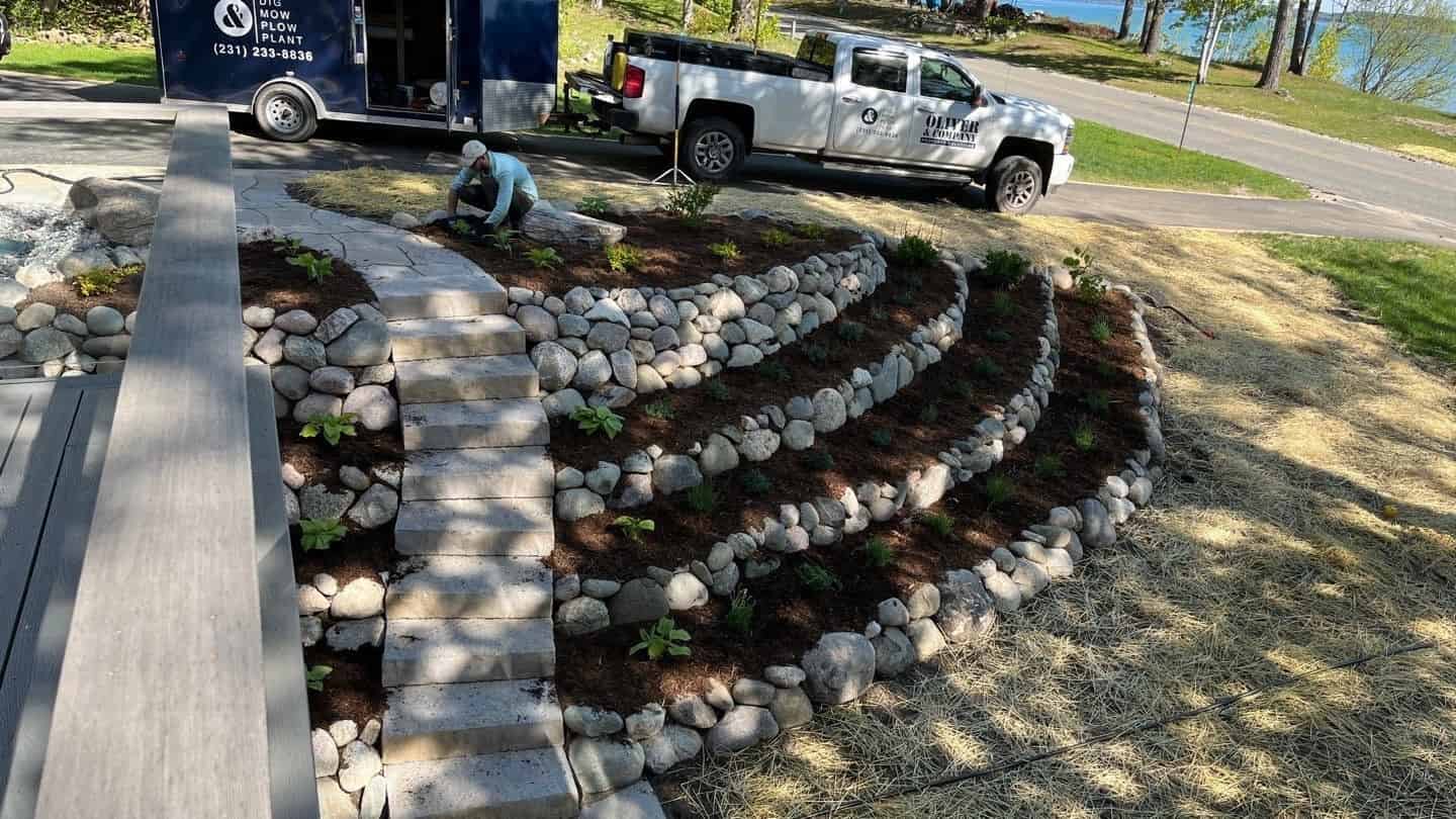 Landscape lighting and hardscape at Lee Point residence