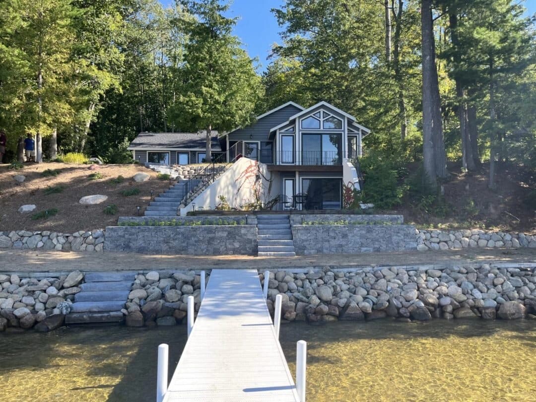 Boulder retaining wall and lakefront terracing at Dave Porath residence