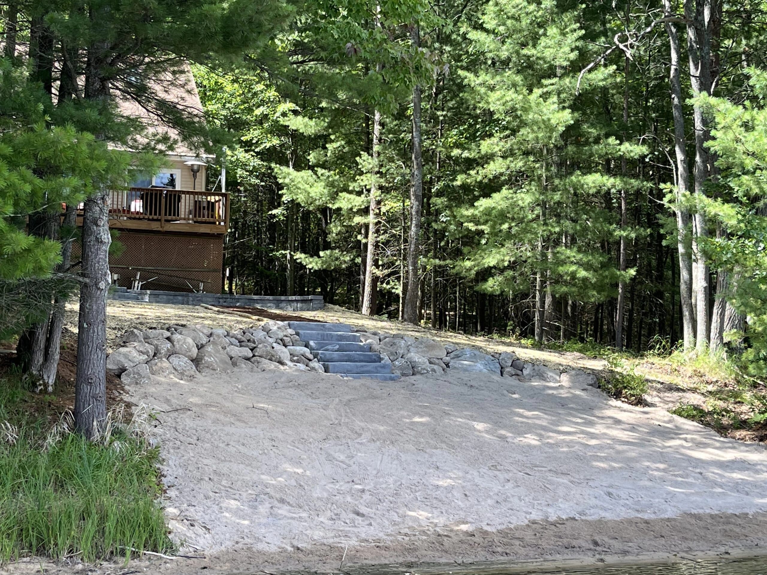 Lakefront steps through boulder wall