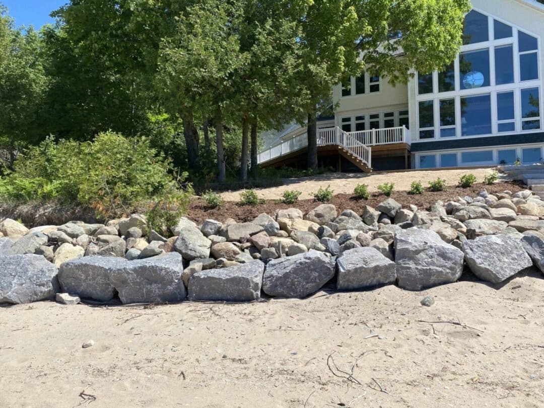 Limestone seawall and restored beach on a Northern Michigan lakefront