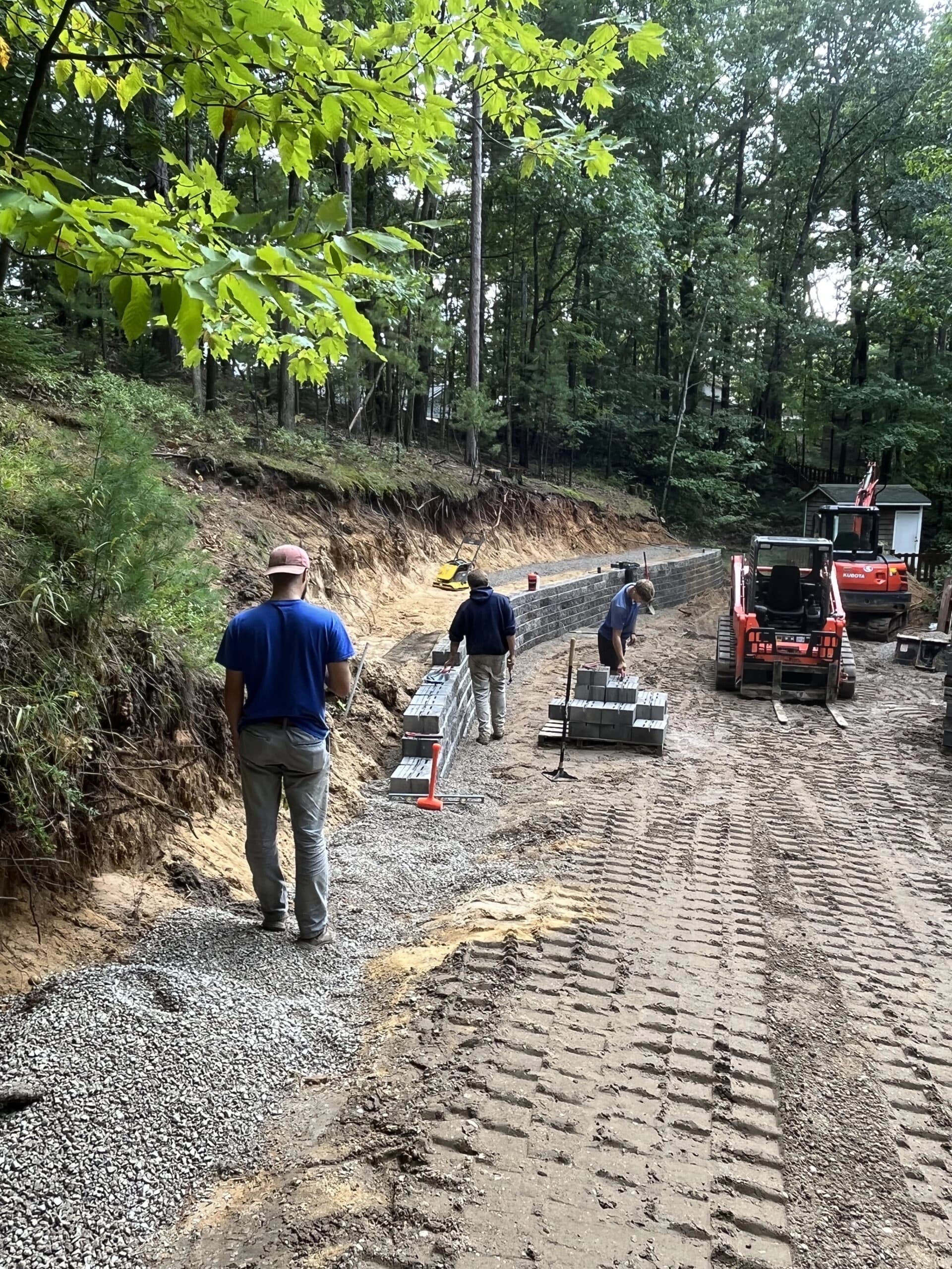 Terraced retaining wall along a residential driveway