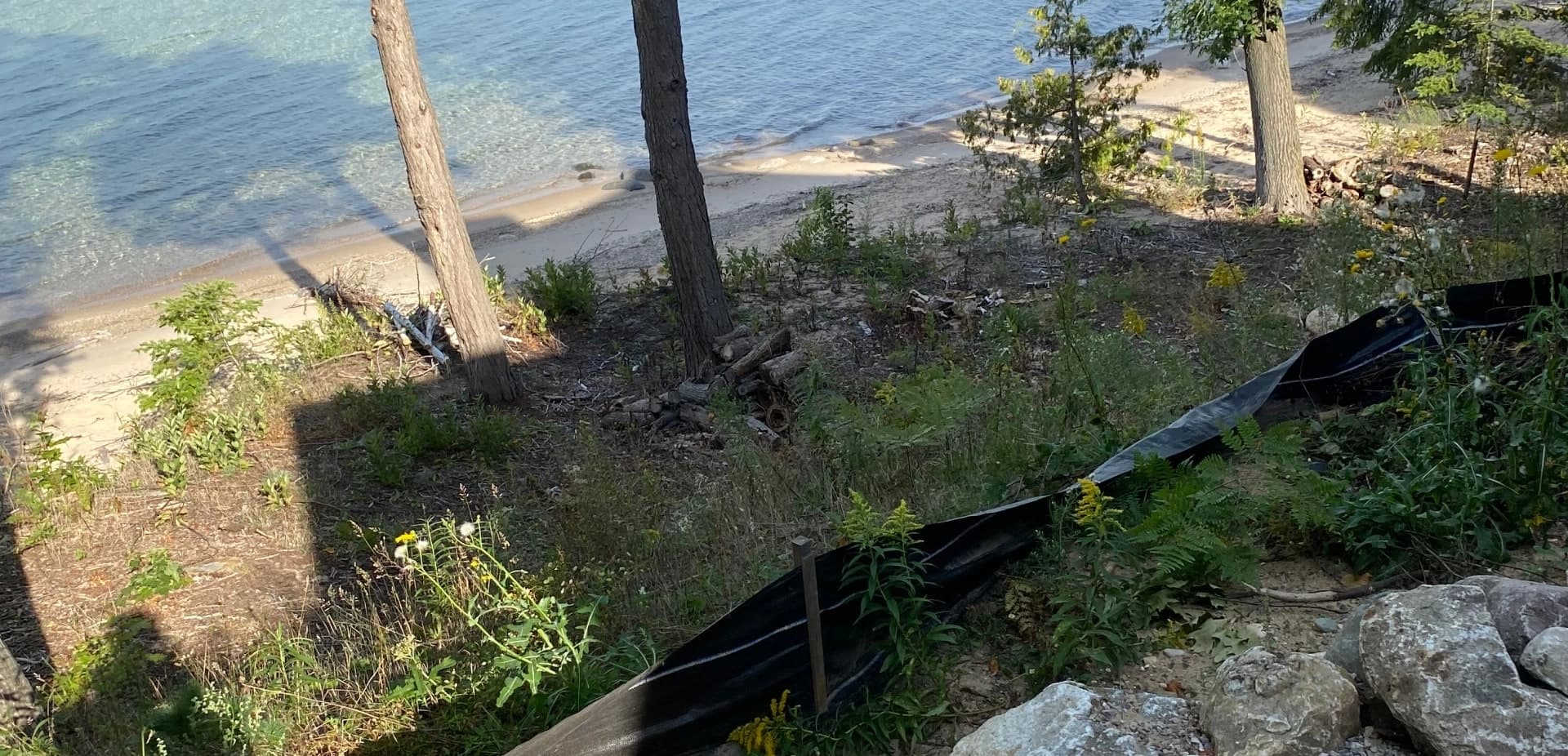 Lakefront site before hardscape installation