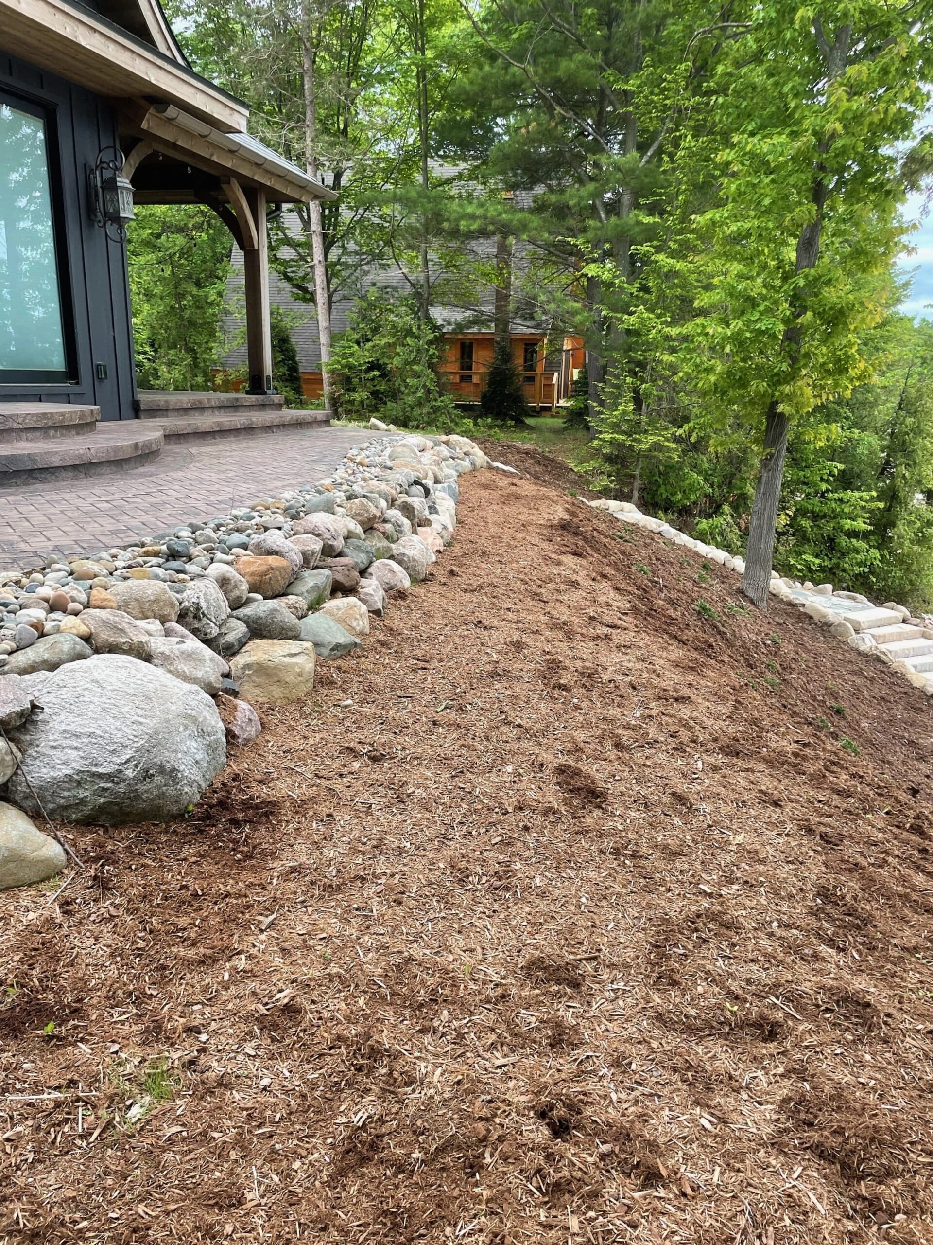 Flagstone landings on a lakefront staircase