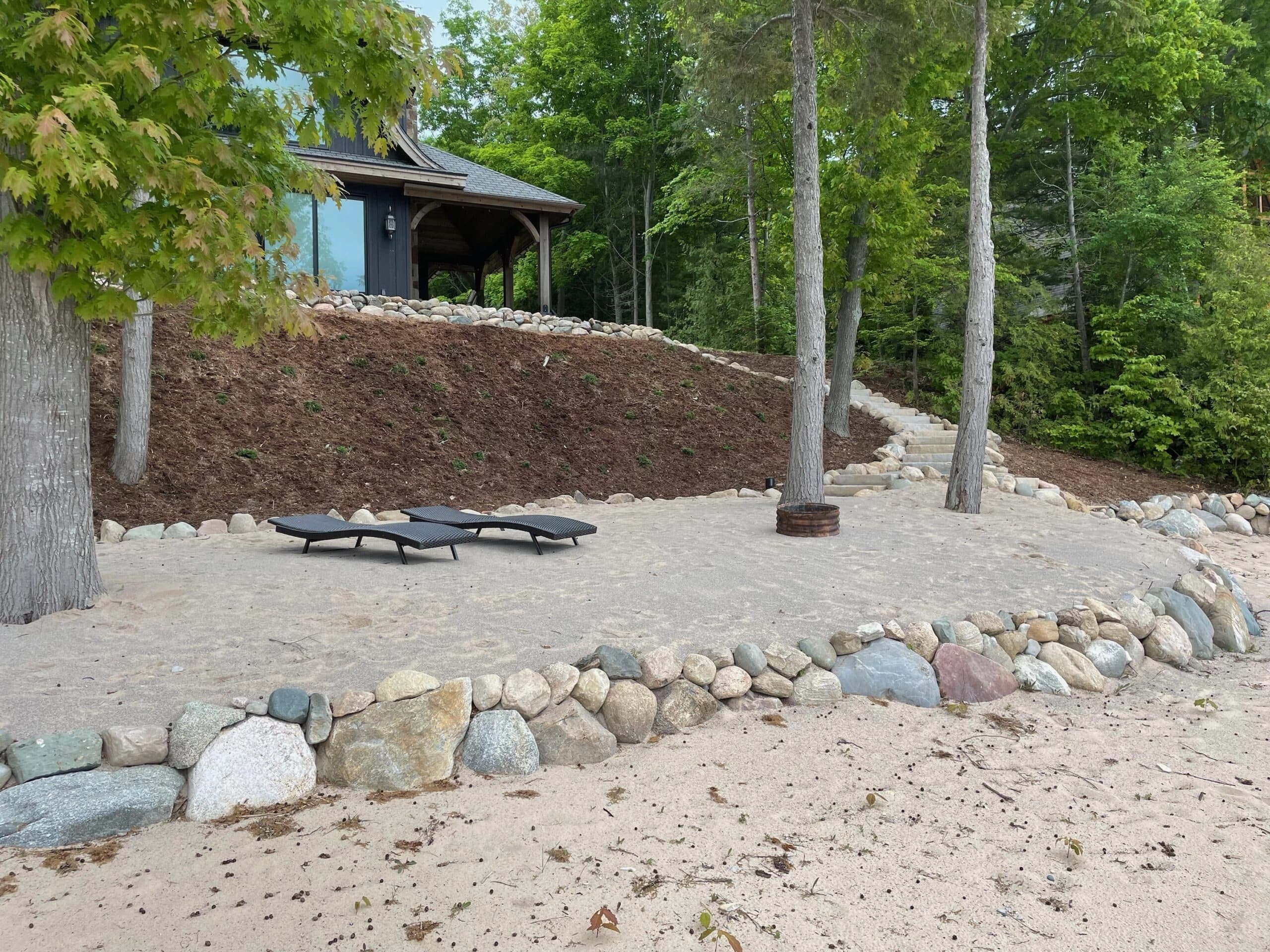 Flagstone landing on the lakeside staircase